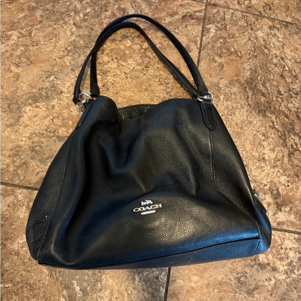 Authentic Black Coach leather shoulder bag, snaps and zipper